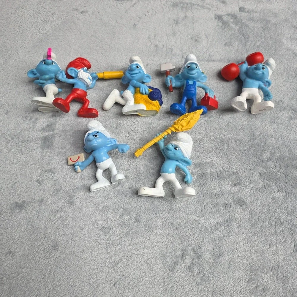 LOT OF 7 VINTAGE THE SMURFS COLECTIBLE FIGURINES FROM MCDONALDS
